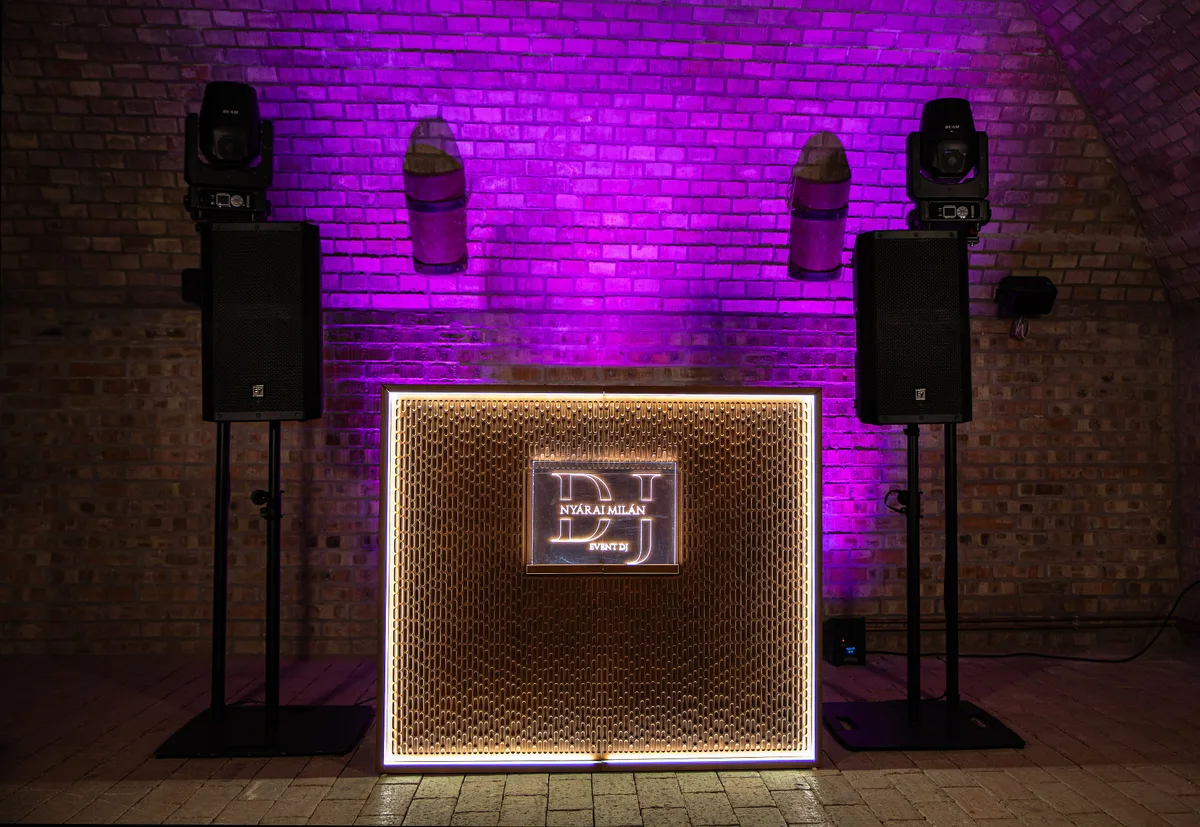 Warm wood-appearance Stereo booth with illuminated frame.