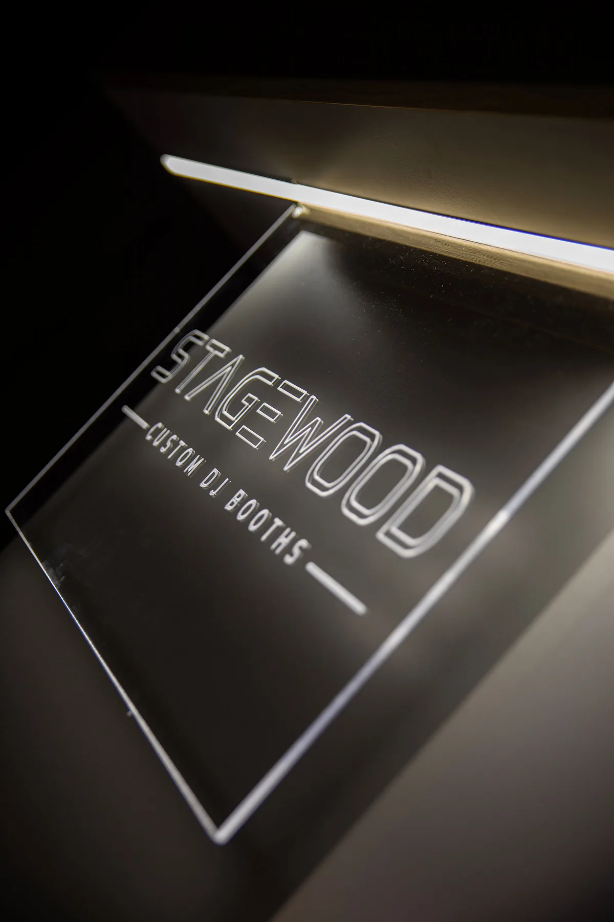 Angled view of Mono’s illuminated logo panel.