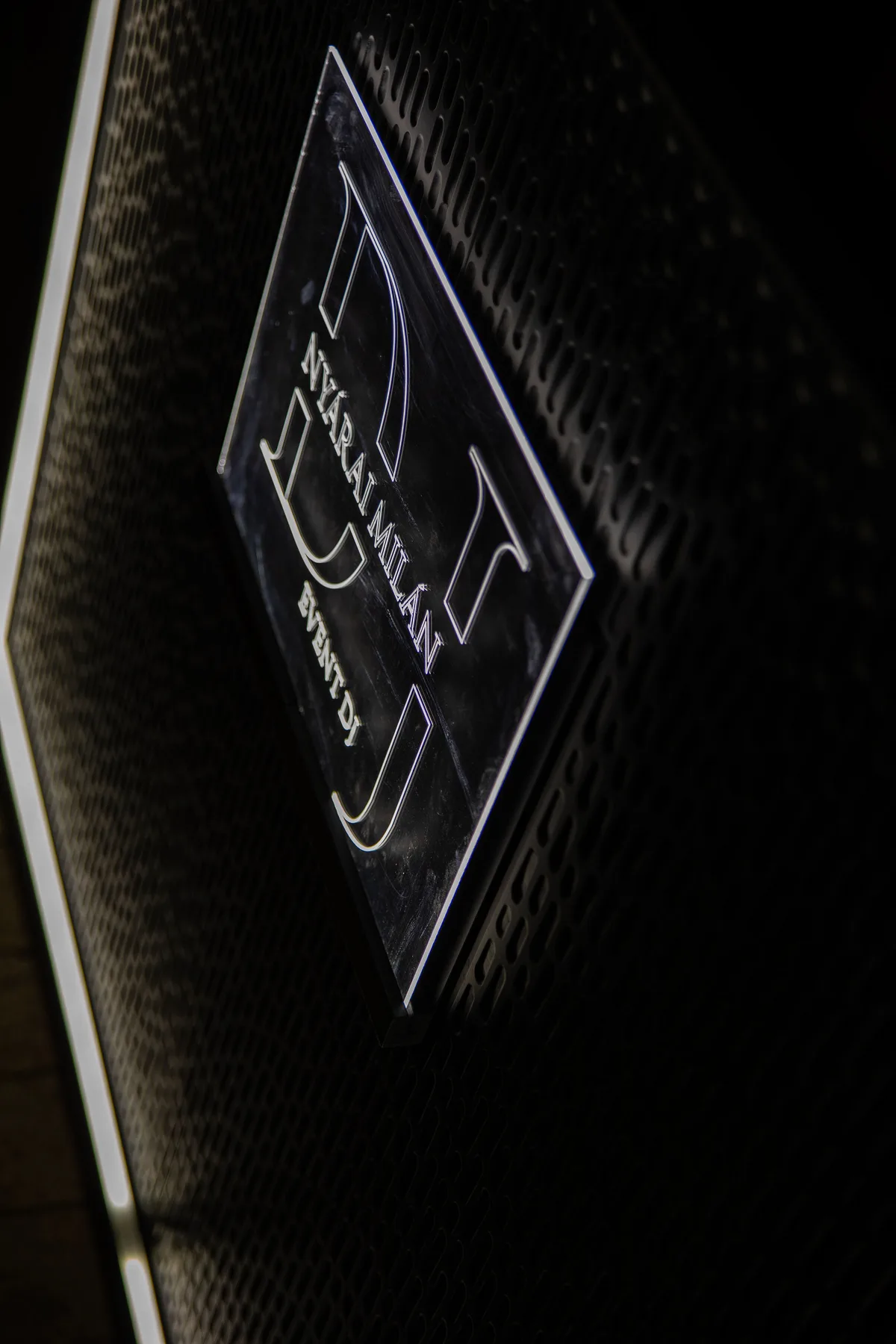 Detail of Stereo’s customer logo and dark front.